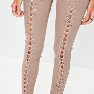 laced up skinny jeans